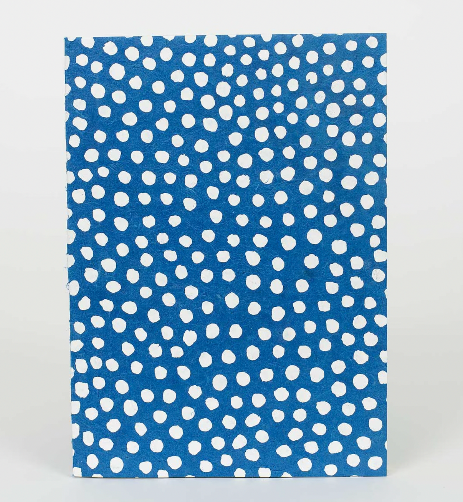 Blue and white notebook (lifestyle)